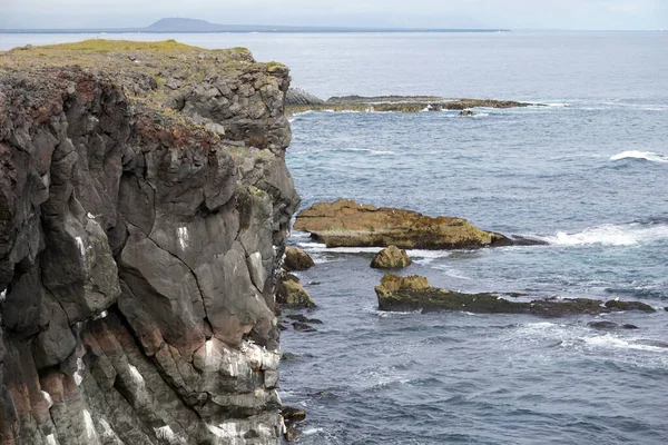 stock image Rocky cliffs in Arnastrapi village at Snaefellsnes Peninsula, Iceland