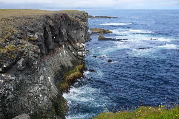 stock image Rocky cliffs in Arnastrapi village at Snaefellsnes Peninsula, Iceland