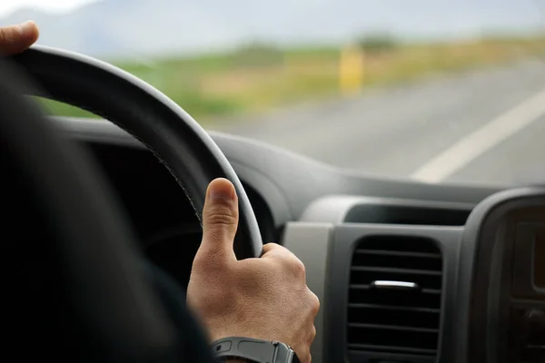 stock image Driving a car - perspective of a driver - bokeh effect