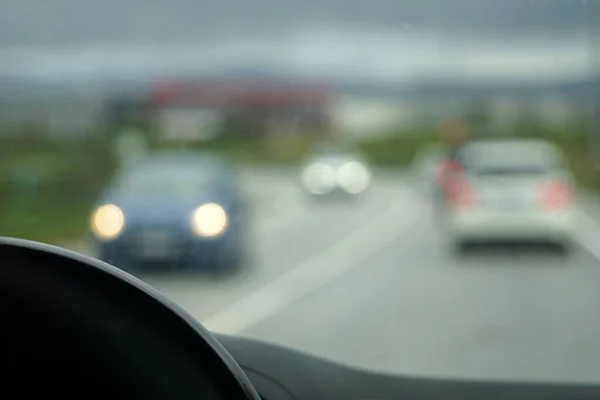 stock image Driving a car - perspective of a driver