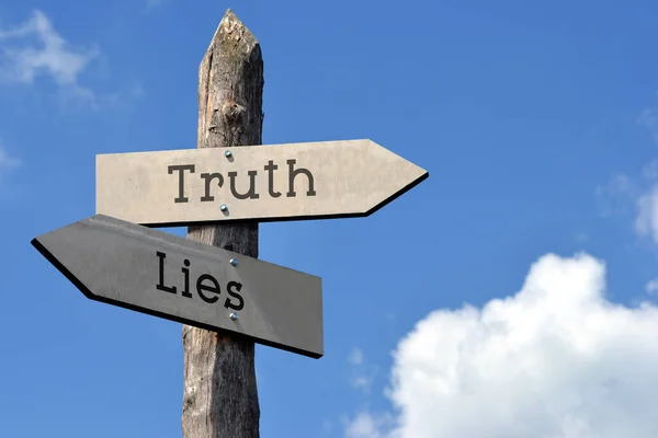 Truth Lies Wooden Signpost Two Arrows Sky Clouds — Stock Photo, Image