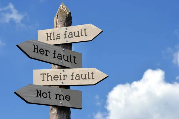 stock image His fault, her fault, their fault, not me - wooden signpost with four arrows, sky with clouds