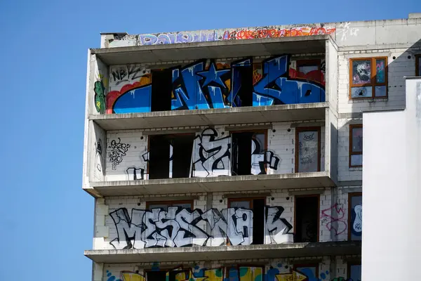 stock image Warsaw, Poland, March 16th 2023 - Unfinished residential building covered with graffiti - abandoned real estate project, bankruptcy concept