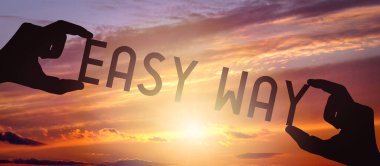 Kolay yol - insan elleri siyah siluet kelimeleri tutuyor