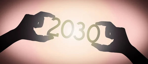 2030年 黒のシルエット年番号 グラデーション背景を持つ人間の手 — ストック写真