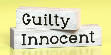 Innocent, guilty - words on wooden blocks - 3D illustration clipart