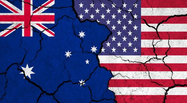 Flags of Australia and USA on cracked surface - politics, relationship concept
