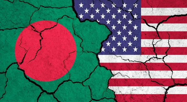 Flags of Bangladesh and USA on cracked surface - politics, relationship concept