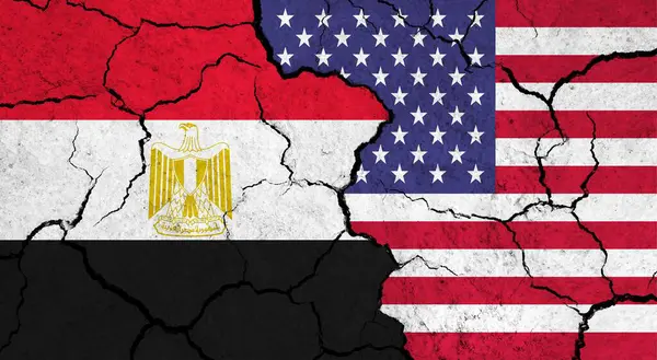 Flags of Egypt and USA on cracked surface - politics, relationship concept