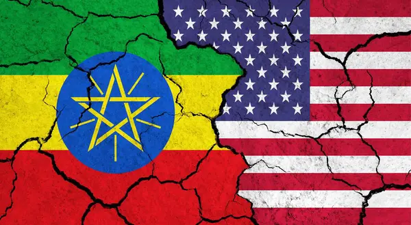 Flags of Ethiopia and USA on cracked surface - politics, relationship concept
