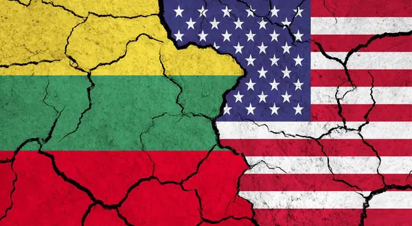 Flags of Lithuania and USA on cracked surface - politics, relationship concept