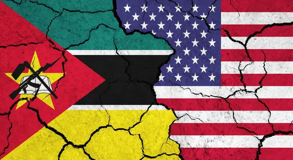 Flags of Mozambique and USA on cracked surface - politics, relationship concept