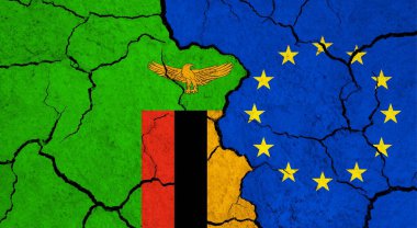 Çatlak yüzeyde Zambiya ve Avrupa Birliği bayrakları - politika, ilişki konsepti