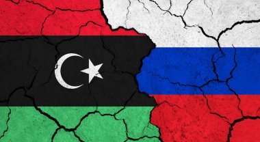 Çatlamış yüzeyde Libya ve Rusya 'nın bayrakları - politika ve ilişki kavramı