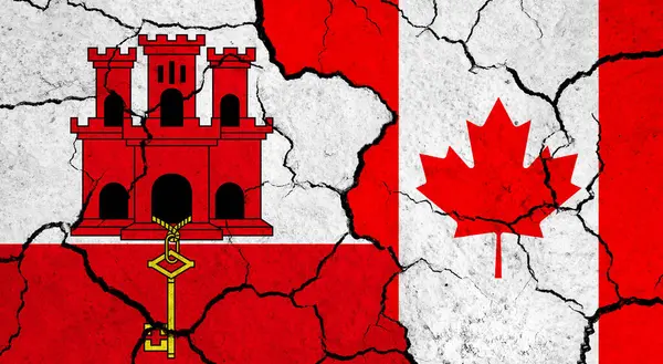 Flags of Gibraltar and Canada on cracked surface - politics, relationship concept
