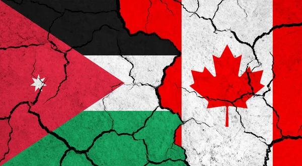 Flags of Jordan and Canada on cracked surface - politics, relationship concept