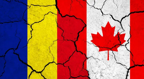 stock image Flags of Romania and Canada on cracked surface - politics, relationship concept