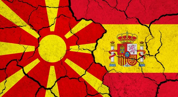 马其顿和西班牙关于分裂的表面政治 关系概念的旗帜 — 图库照片