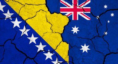 Çatlak yüzey üzerinde Bosna ve Avustralya bayrakları - politika ve ilişki kavramı