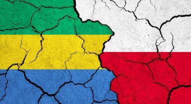 Çatlak yüzey üzerinde Gabon ve Polonya 'nın bayrakları - politika, ilişki konsepti