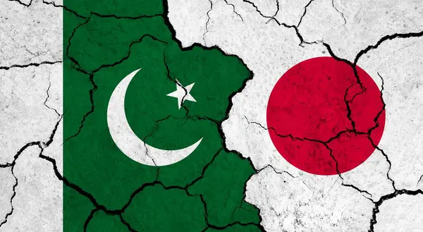 Flags of Pakistan and Japan on cracked surface - politics, relationship concept