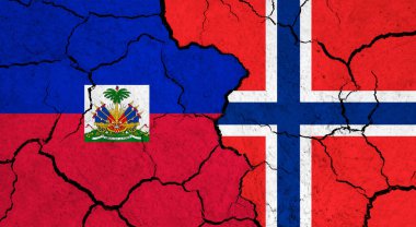 Çatlak yüzeyde Haiti ve Norveç bayrakları - politika, ilişki konsepti