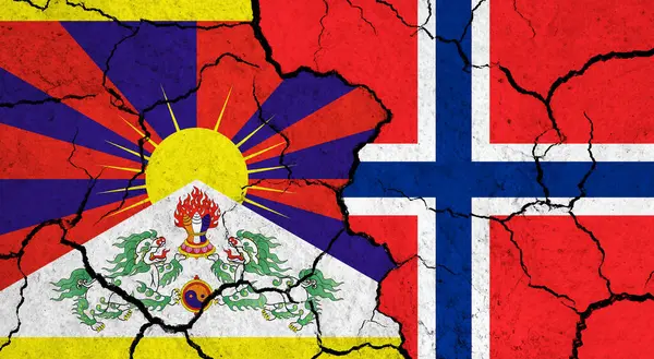 Flags of Tibet and Norway on cracked surface - politics, relationship concept