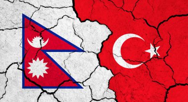 Çatlak yüzey üzerine Nepal ve Türkiye bayrakları - siyaset ve ilişki kavramı