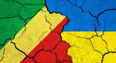 Çatlak yüzeyde Kongo ve Ukrayna bayrakları - politika, ilişki konsepti