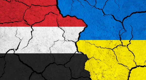 Flags Yemen Ukraine Cracked Surface Politics Relationship Concept — Stock Photo, Image