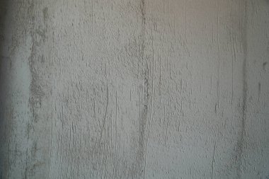 Gri, sert beton duvar yüzeyi