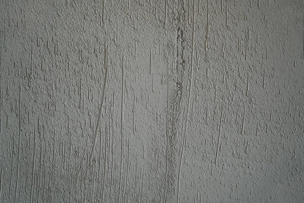 Grey, rough concrete wall surface