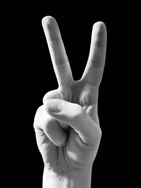 Human Hand Showing Two Fingers Peace Sign Stock Picture