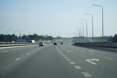 Warsaw, Poland - March 10th, 2024 - S2 expressway from driver's perspective clipart