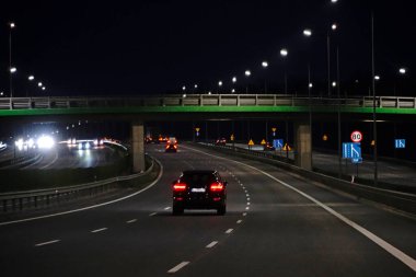 Warsaw, Poland - March 10th, 2024 - Overpass over S2 expressway - night photograph clipart
