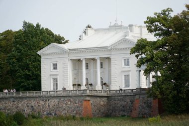 Trakai, Lithuania - September 13th 2023 - Uzutrakis Manor, Tyszkiewicz family palace - view from Galve lake side clipart