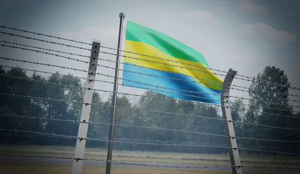 stock image Barbed wire fence and flag of Gabon - border concept - 3d illustration