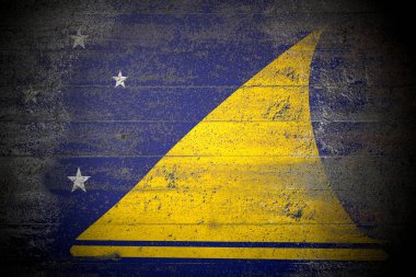 Flag of Tokelau on rough concrete wall clipart