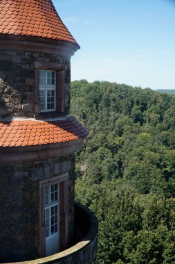 Walbrzych, Poland - August 12th, 2024 - Ksiaz Castle - round tower and trees in a distance clipart