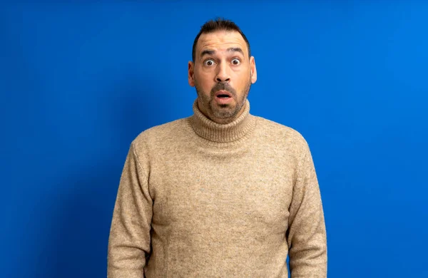 Bearded Hispanic Man Wearing Turtleneck Sweater Open Mouth Amazed Absorbed — Stock Photo, Image