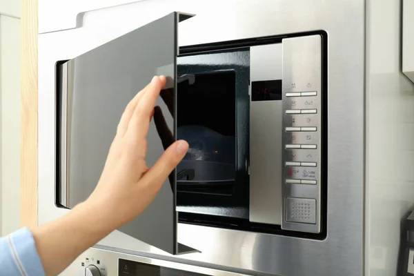Young Woman Hand Close Modern Microwave — Stock Photo, Image