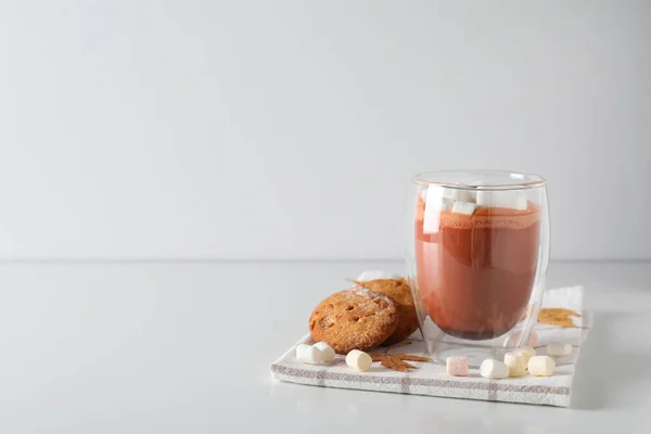 Concept of sweet drink, tasty cocoa drink with marshmallow, space for text
