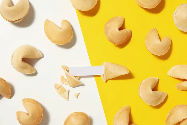 stock image Chinese fortune cookies with prediction words, top view