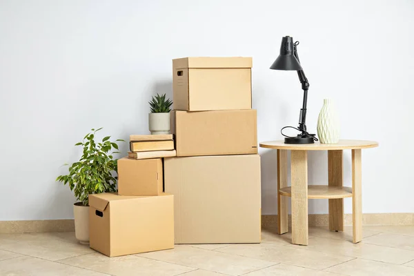Concept of move in modern flat with boxes