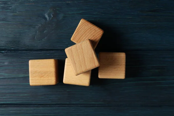 stock image Blank wooden cubes for different concepts, top view