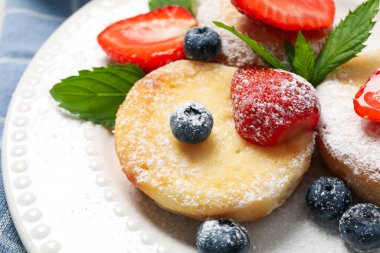 Concept of tasty sweet food, cheese pancakes, close up