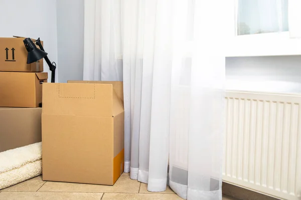 Concept of move in modern flat with boxes