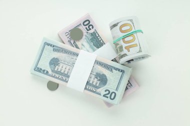 Concept of financials, dollars and coins isolated on white background