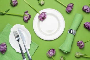 Concept of spring season table setting, top view