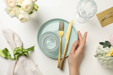 Concept of spring season table setting, top view